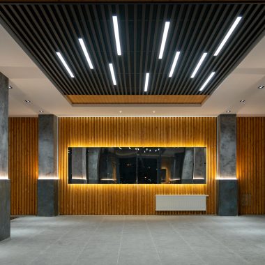Sleek lobby interior featuring modern architecture and innovative lighting design.